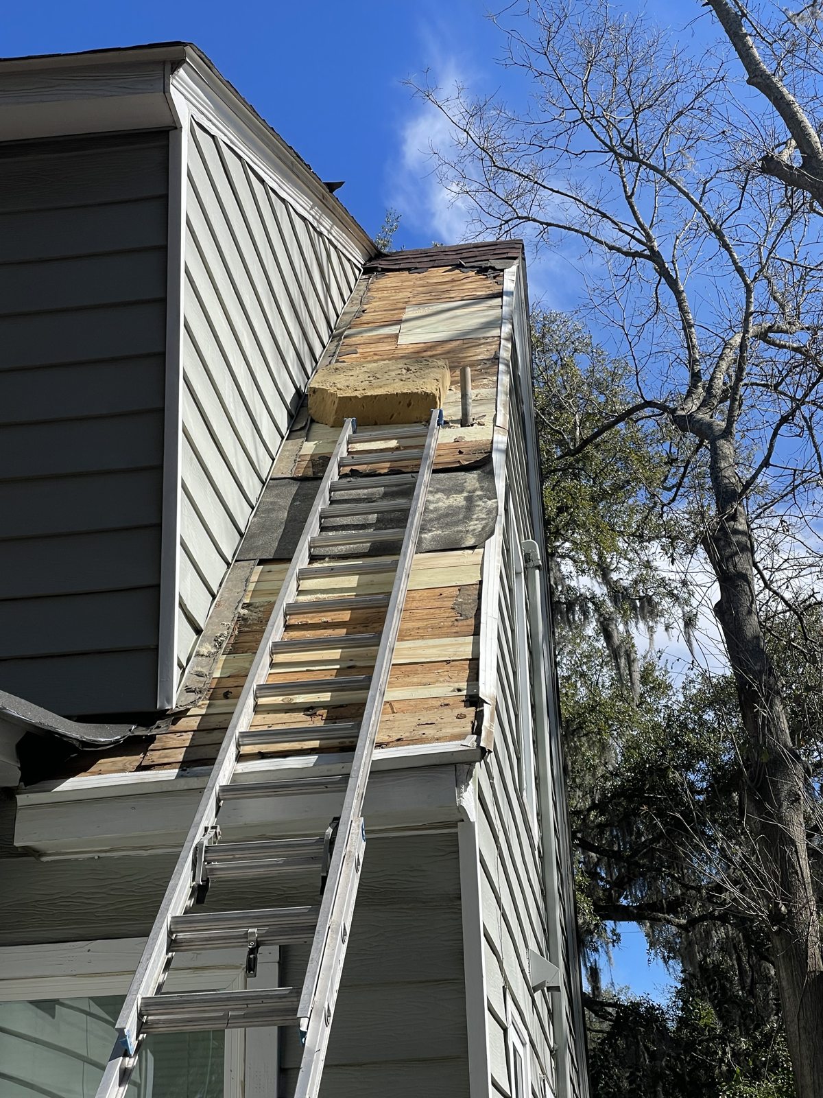 Roof repair by Coastal Roofing Solutions
